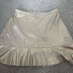 Free people skirt. Size 2. Gold. Never worn.